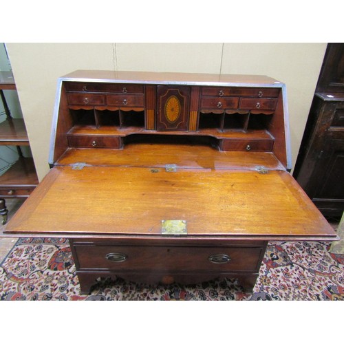 1380 - A Georgian mahogany bureau with inlaid detail of four long graduated drawers, the fall flap enclosin... 