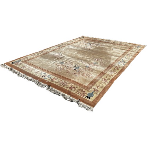 1603 - A Chinese wool carpet with flowers and vases on a cream ground and floral borders 380cm x 280cm appr... 