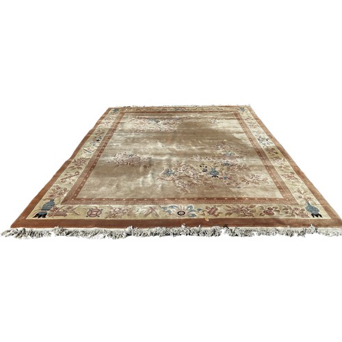 1603 - A Chinese wool carpet with flowers and vases on a cream ground and floral borders 380cm x 280cm appr... 