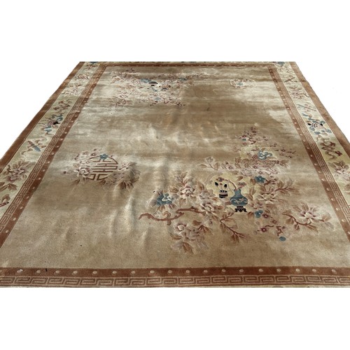 1603 - A Chinese wool carpet with flowers and vases on a cream ground and floral borders 380cm x 280cm appr... 