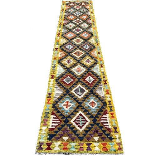 1620 - A Maimana Kilim Runner, with an all over multicoloured diamond pattern, 408cm x 83cm approximately