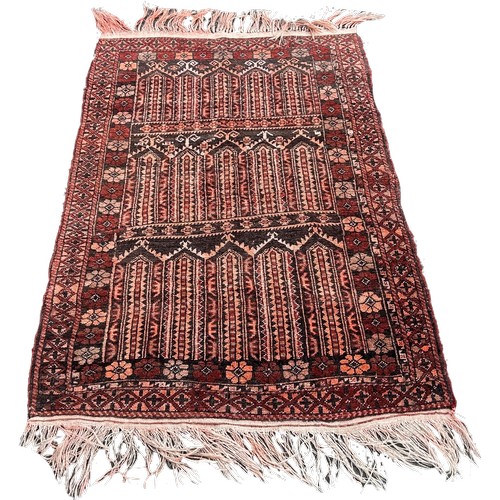 1629 - A small Afghan prayer mat with geometric panels and floral surround, 140cm x 90cm approximately