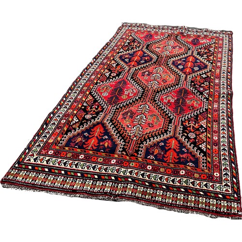 1630 - South West Persian Qashgai rug, with an all over interlocking lozenge pattern 280cm x 148cm approxim... 