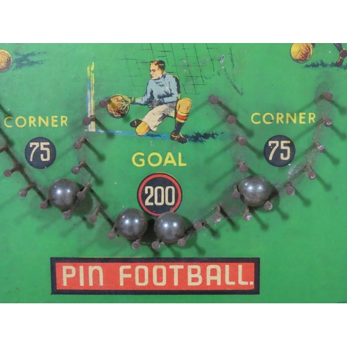 361 - An Association Football 'Pin Football' bagatelle board with four ball bearings.