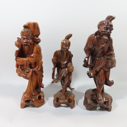 362 - Nine Chinese hardwood carvings of Sages, Craftsmen, Farmers, Fishermen etc