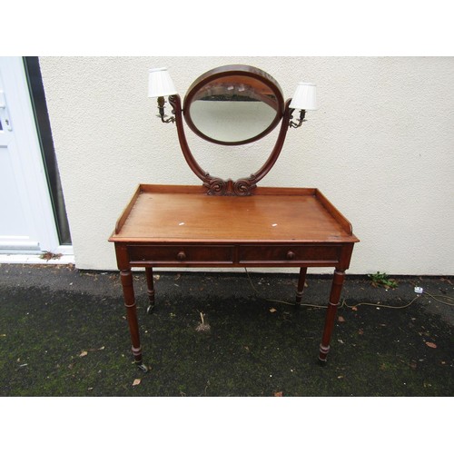 1513 - A late Victorian dressing table with integrated girandole lights on turned supports