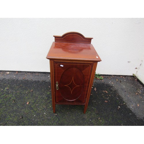 1519 - A marble topped dressing table partially enclosed by drawers and cupboards, with shaped splash back ... 