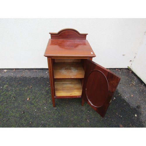 1519 - A marble topped dressing table partially enclosed by drawers and cupboards, with shaped splash back ... 