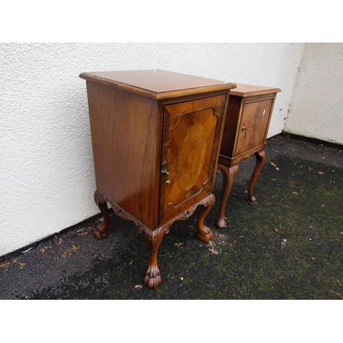 1520 - A figured walnut bedside cupboard on cabriole supports, further example on lions paw feet