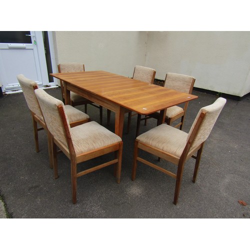 1526 - A Gordon Russell of Broadway pale walnut dining room set comprising extending dining table with orig... 