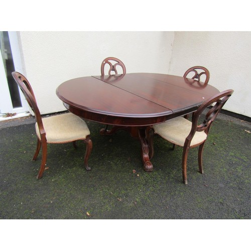 1529 - Victorian mahogany D end extending dining table to seat six, raised on a turned pillar and carved tr... 