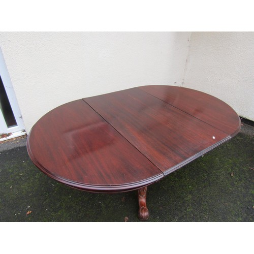 1529 - Victorian mahogany D end extending dining table to seat six, raised on a turned pillar and carved tr... 