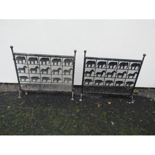 1540 - A pair of iron work fire screens with animal detail, each 70cm wide x 60cm tall