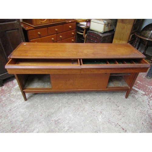 1543 - A mid 20th century teak sideboard enclosed by two sliding doors with two drawers, 160cm wide