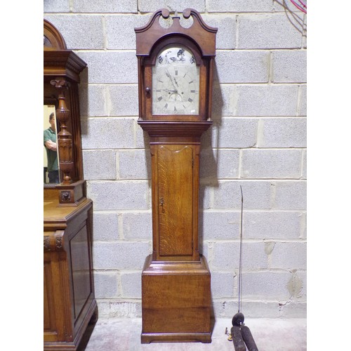 1342 - A Georgian oak longcase clock with broken arch silvered dial, subsidiary calendar and secondary dial... 