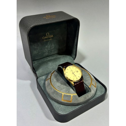 311 - Omega: A gentleman's vintage gold plated Omega Seamaster automatic wrist watch, on Omega leather str... 