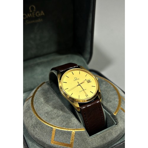 311 - Omega: A gentleman's vintage gold plated Omega Seamaster automatic wrist watch, on Omega leather str... 