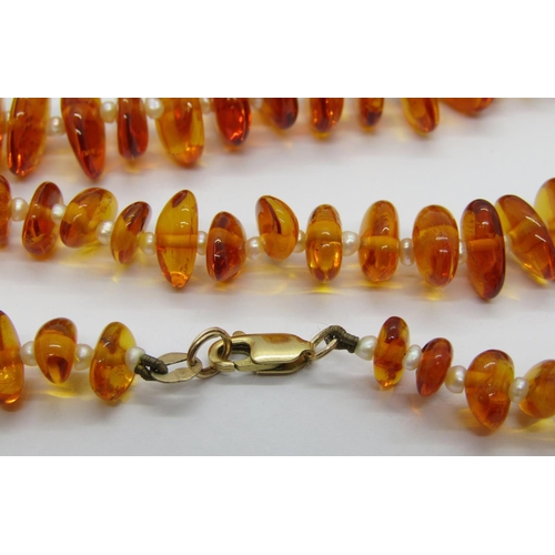 272 - Collection of amber jewellery comprising mixed silver pieces to include necklaces, pendants, a brace... 