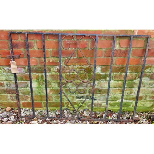 1027 - A pair of heavy gauge ironwork driveway entrance gates, with vertical open square rails flanking cen... 