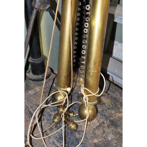 1076 - A pair of Victorian brass curtain rails/poles with sphere finials, sliding track and weight draw cor... 