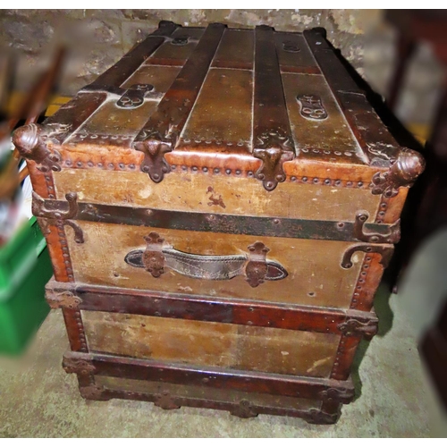 1122 - A 19th century American wooden lathe banded steamer trunk with steel fittings, raised on later casto... 