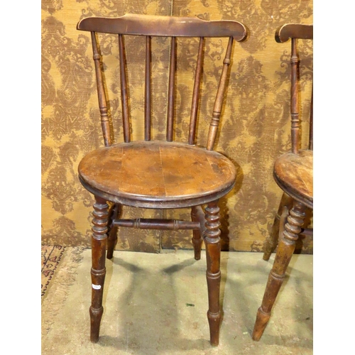 1133 - A set of four Swedish stained beechwood stick back kitchen  chairs