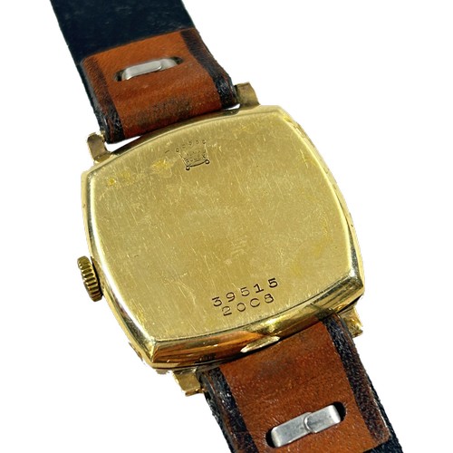 320 - Rolex: A gentleman’s vintage 9ct yellow gold cased wristwatch, the rounded squared silvered dial wit... 