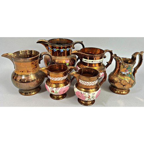 147 - A collection of 19th century lustre ware jugs (19 approx).