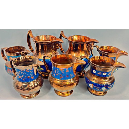 147 - A collection of 19th century lustre ware jugs (19 approx).