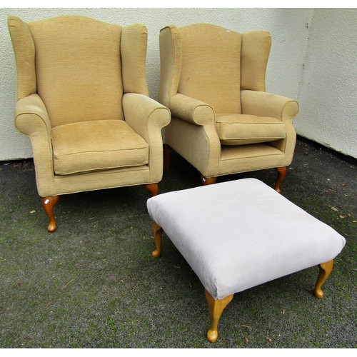 1487 - A Pair of Georgian style wing chairs in a pale mustard upholstery on cabriole supports, together wit... 