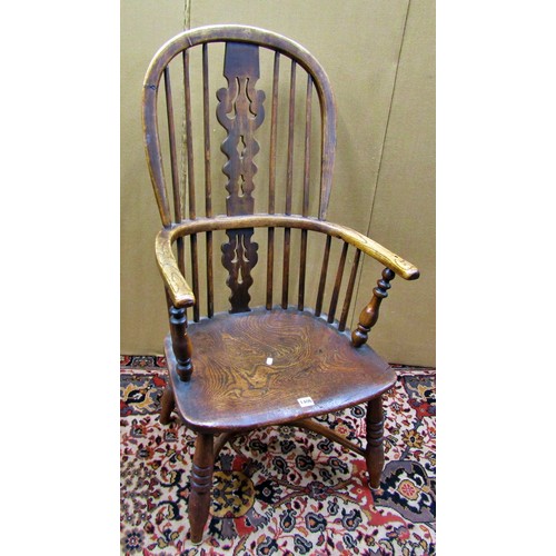 1406 - A Georgian Windsor elbow chair in elm and ashwood