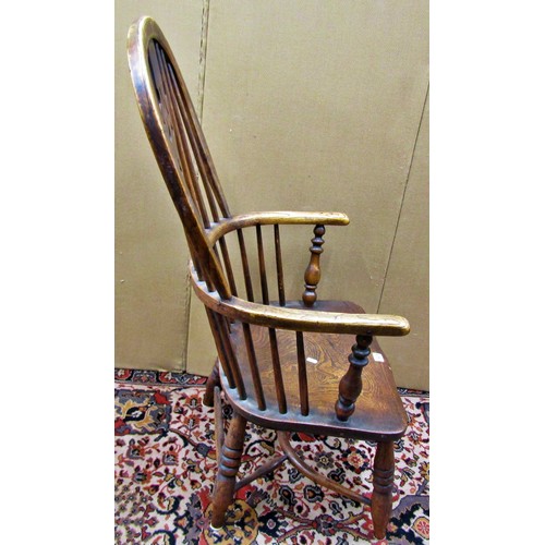 1406 - A Georgian Windsor elbow chair in elm and ashwood