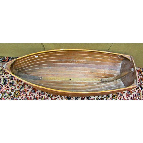 1407 - A model open ship's hull of cleated construction, 105cm long