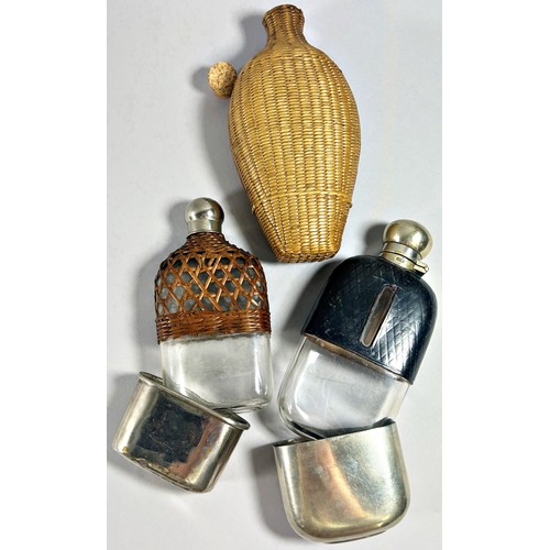 283 - Three antique hip flasks to include two silver plated jacketed examples (3).