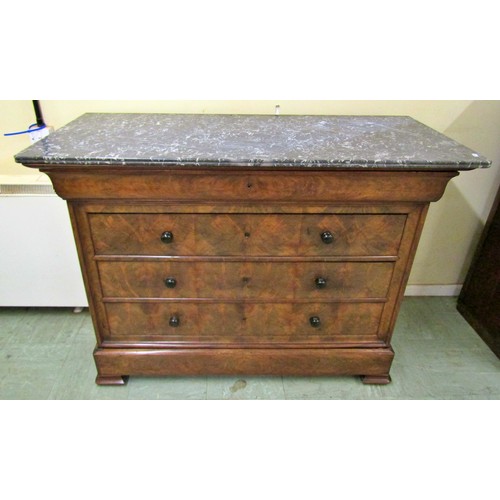 1554 - 19th century mahogany commode of four long drawers with well matched flame veneers, beneath a marble... 