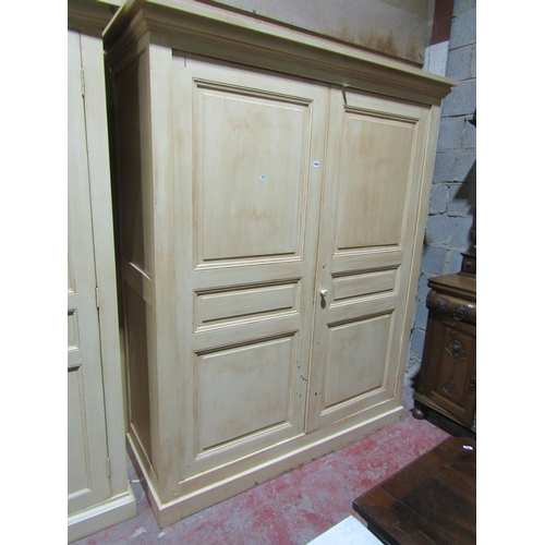 1572 - A 19th century pine wardrobe enclosed by a pair of panelled doors, with later painted finish, 170cm ... 