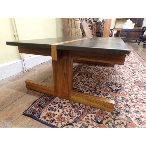 1573 - A contemporary Gordon Russell of Broadway centre table of rectangular form with leather top and rose... 