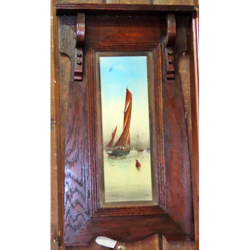 1308 - A late Victorian overmantel mirror, the mahogany frame enclosing an arrangement of watercolours of s... 