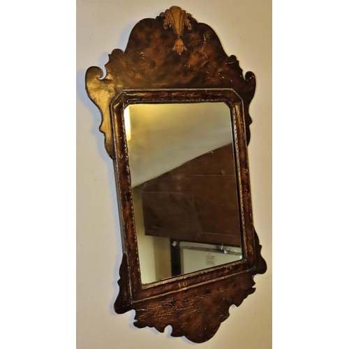 1314 - A small Georgian style wall mirror with fret 
carved outline, 67cm x 38cm