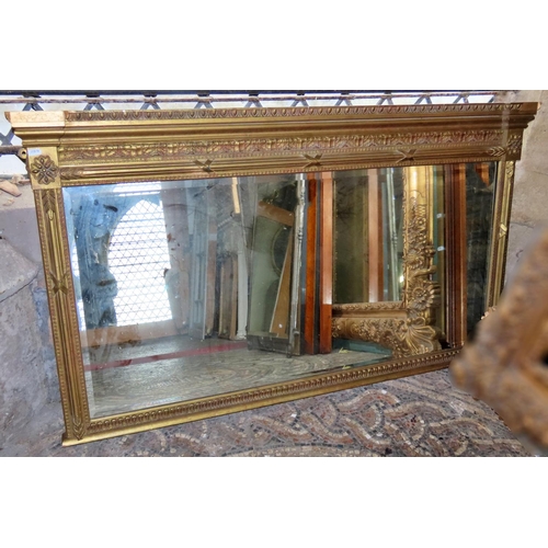 1315 - A regency style gilt framed overmantel mirror, with decorative moulded frame and bevelled edge plate... 