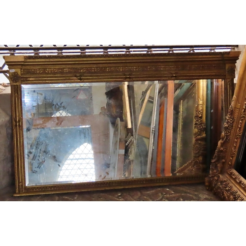 1315 - A regency style gilt framed overmantel mirror, with decorative moulded frame and bevelled edge plate... 