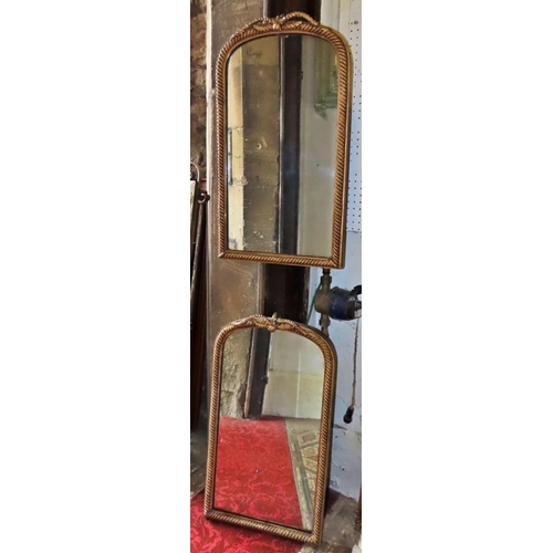 1318 - A pair of 19th century rope twist wall mirrors of slender arched form, (af) 63cm x 36cm