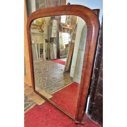 1323 - A Victorian walnut over mantel mirror the moulded arched frame with banded detail, 110cm x 86cm (af)