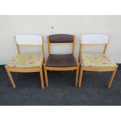 1575 - A pair of vintage Ercol tables, the elm tops raised on circular supports, 1222cm long x 69cm wide, t... 