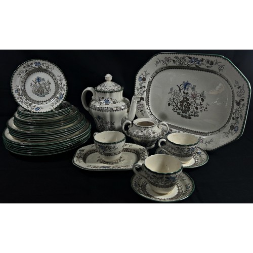 144 - A large collection of English transfer printed ironstone and similar jugs and plates