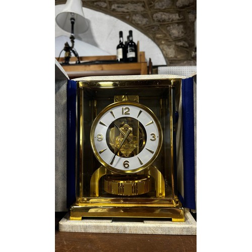 340 - Jaeger-LeCoultre, An ‘Atmos’ table clock, of typical design with gilt brass frame, 22cm high, 18 x 1... 