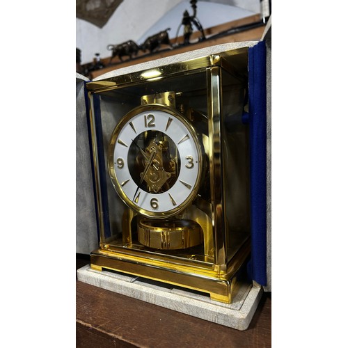 340 - Jaeger-LeCoultre, An ‘Atmos’ table clock, of typical design with gilt brass frame, 22cm high, 18 x 1... 