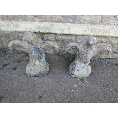 1049 - Pair of weathered cast composition stone eagles, 50cm high