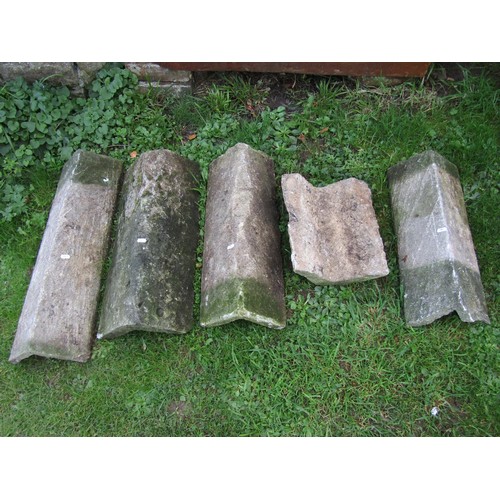 1055 - Group of five weathered stone ridge tiles