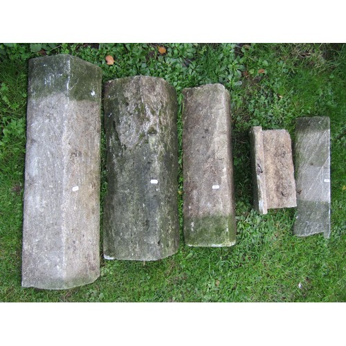 1055 - Group of five weathered stone ridge tiles